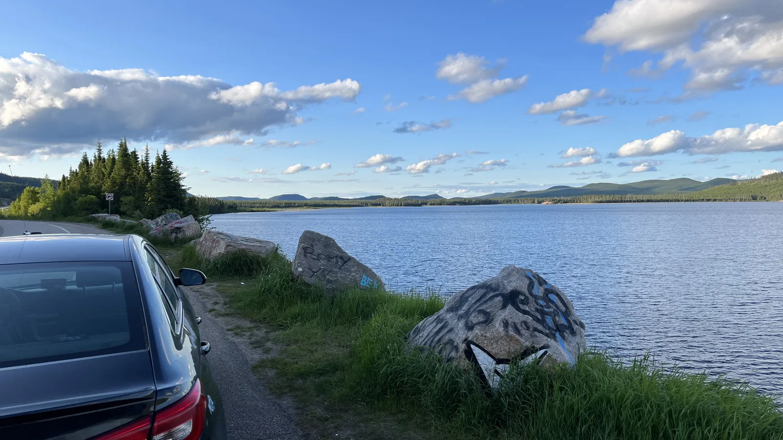A taxi parked beside a lake in the Quebec countryside